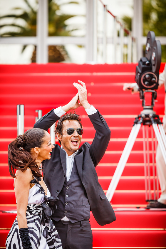 Celebrity couple on red carpet in Cannes. Taken on event iStockalypse Cannes 2010.